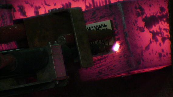 STS5000_05 end of MIG welding of a tag on hot billet
